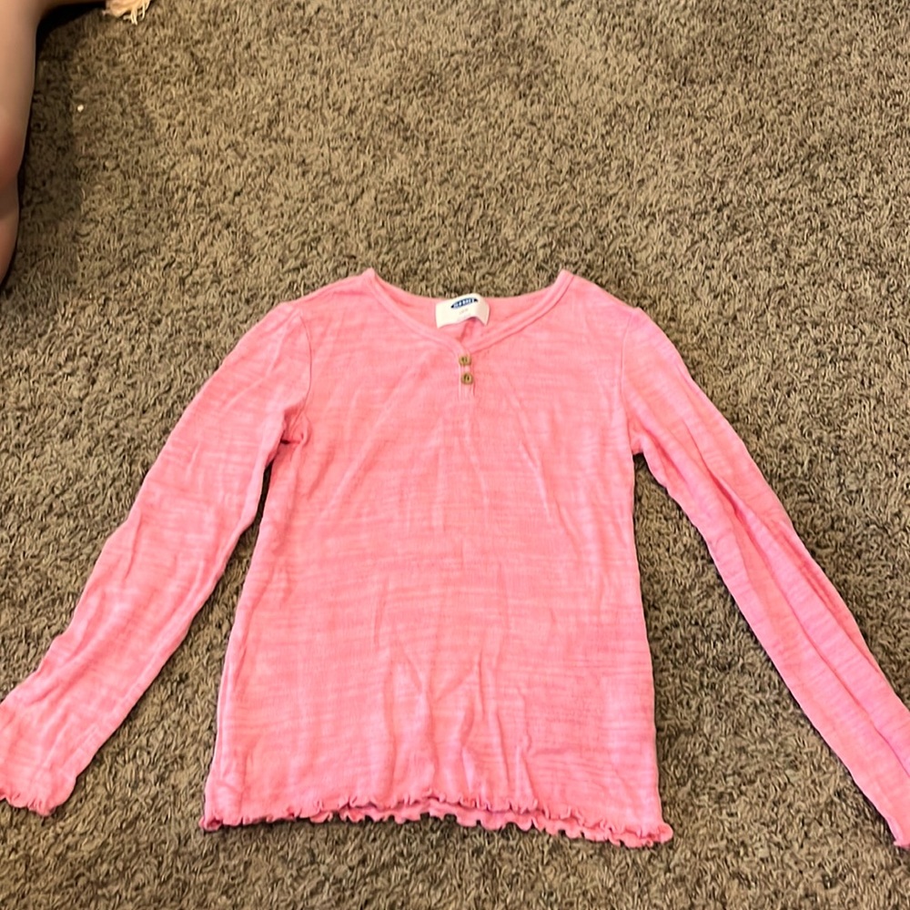stretch and soft and ruffled at the sleeves and bottom
